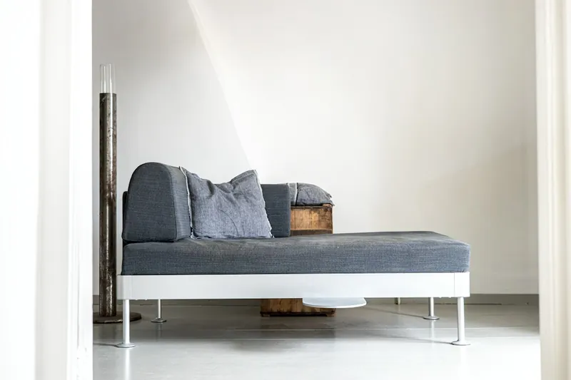 Mango wood rustic daybed in a distressed matte finish