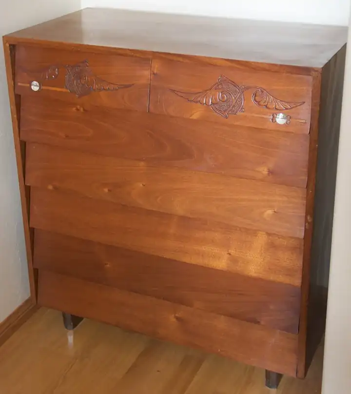 Mid-century modern solid-wood bookshelf with tapered splayed legs and warm walnut-tone finish, handcrafted in Jodhpur, India