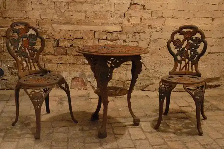 Hand-forged wrought iron and solid-wood furniture made in Jodhpur, India